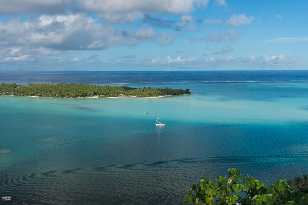 The island of Maupiti seen from the top of a hill. 