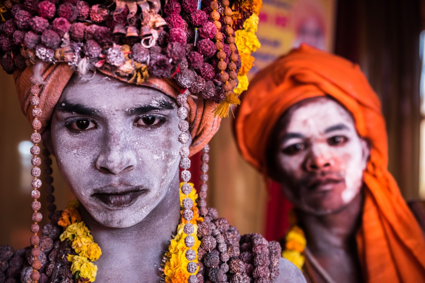 Two young Naga baba's pose in front of the camera, Kumbh mela, India.